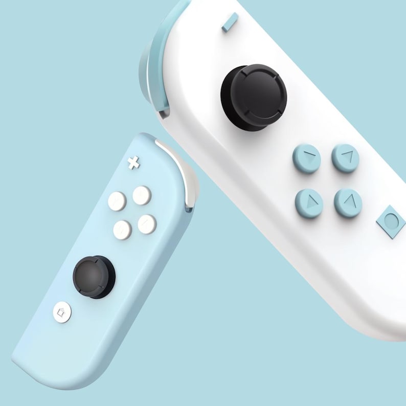 May include: Two blue and white Nintendo Switch Joy-Con controllers. One controller is white with blue buttons and the other is blue with white buttons.