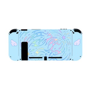 May include: A light blue Nintendo Switch console with a custom skin featuring a swirling, colorful design. The skin has a pastel color palette with pink, yellow, and blue accents. Small white angel wings are on each side.