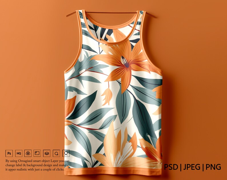 K&ouml;nnte beinhalten: Ein wei&szlig;es Tanktop mit einem floralen Muster in Orange-, Gr&uuml;n- und Wei&szlig;t&ouml;nen. Das Tanktop hat einen d&uuml;nnen orangen Saum an Hals und Arml&ouml;chern.