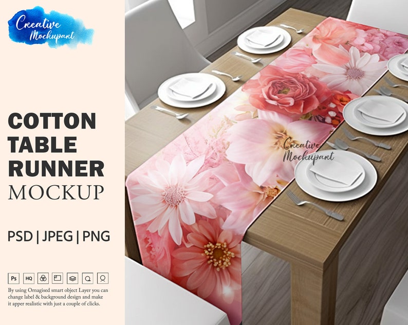 May include: A floral cotton table runner mockup featuring a vibrant design of pink and red flowers. The runner is displayed on a wooden table set with white plates, silverware, and napkins. The text "COTTON TABLE RUNNER MOCKUP" is visible.