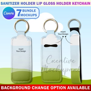 May include: A mockup of a customizable keychain holder for sanitizer or lip gloss. The holder is made of light blue and green fabric with a white insert area for adding a design. The keychain is attached to a black strap. The text "Insert Your Design" is visible on the mockup.