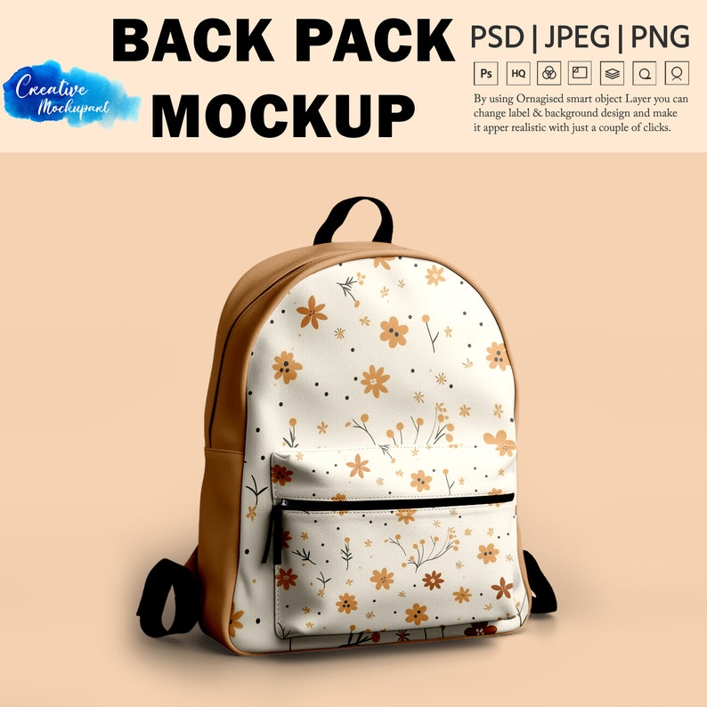 May include: A brown leather backpack with a white canvas front featuring a floral pattern in shades of yellow and brown. The backpack has a zippered front pocket and adjustable straps.