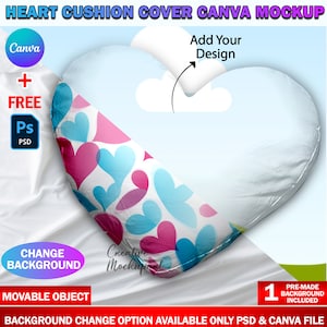 May include: A heart-shaped cushion cover mockup with a white background. The cushion features a design of pink and blue hearts. Text on the image includes "Heart Cushion Cover Canva Mockup", "Add Your Design", and "Change Background".