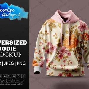 May include: Oversized hoodie mockup with a floral pattern in shades of pink, orange, and yellow on a cream background. The hoodie has a pink hood and a drawstring.