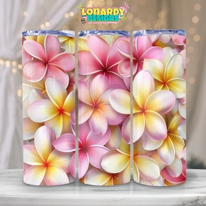 May include: A set of three stainless steel tumblers with a floral design. The tumblers feature a pattern of pink and yellow plumeria flowers.