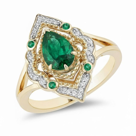 Enchanted Disney Aladdin Pear-shaped Swiss Blue Topaz and Diamond