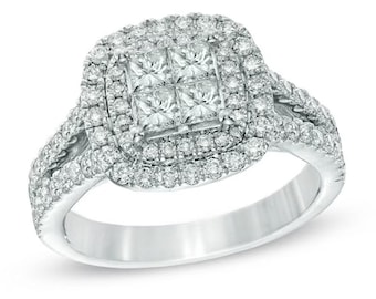 May include: A silver engagement ring with a square-shaped center stone surrounded by smaller diamonds. The ring has a double halo of diamonds and a twisted band.