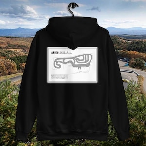 May include: Black hooded sweatshirt with a white print of a track map. The map is labeled "Ebisu Minami  Road Course" and shows the layout of the track.