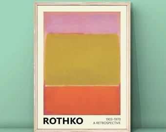 May include: A framed poster with a minimalist abstract painting in shades of pink, yellow, and orange. The poster features the text "ROTHKO 1903-1970 A RETROSPECTIVE".
