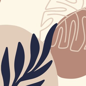 May include: Abstract art print featuring a stylised leaf design in navy blue against a background of beige and brown organic shapes.