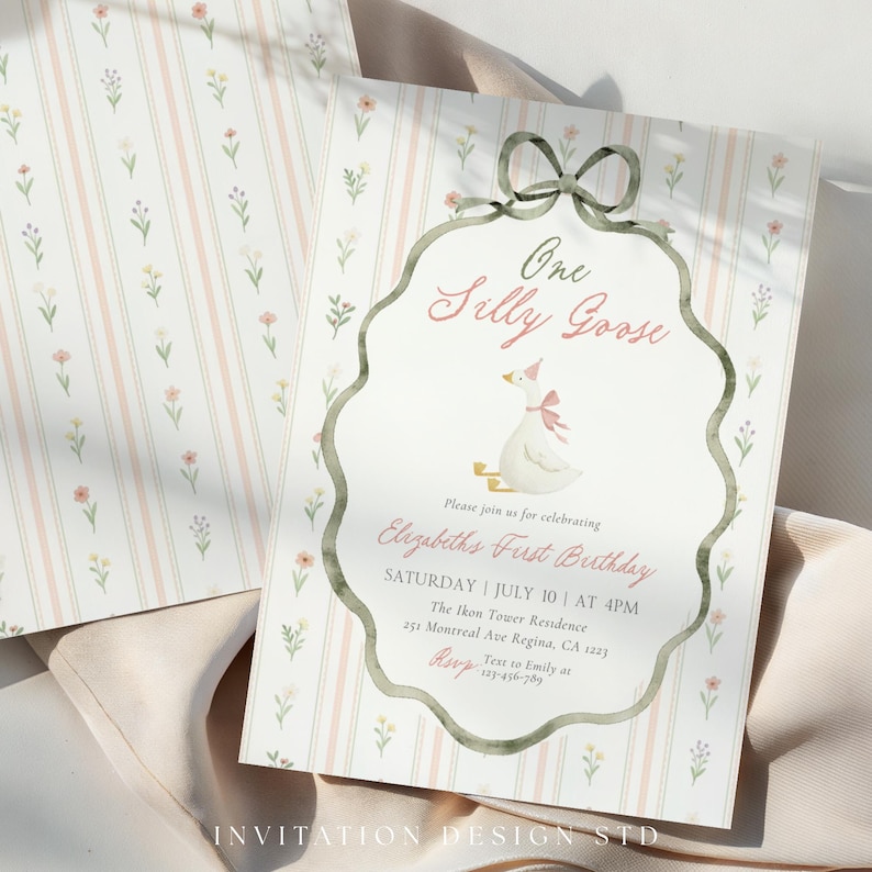 May include: A whimsical invitation card with a watercolor illustration of a goose wearing a party hat and bow. The text reads "One Silly Goose" and "Elizabeth's First Birthday". The background features a floral and striped pattern.