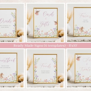 Pode incluir: Seis placas emolduradas com bordas douradas, apresentando ilustra&ccedil;&otilde;es florais e de fadas. As placas dizem "Drinks", "Cards & Gifts", "Favors", "Guestbook", "Foods" e "Sweet & Treats". O texto "Ready Made Signs (6 templates) - 8'x10'" tamb&eacute;m est&aacute; presente.