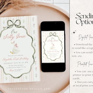 May include: A birthday invitation with a whimsical design featuring a goose wearing a pink bow. The invitation includes the text "One Silly Goose" and event details. A smartphone displays the same invitation. The invitation is on a decorative tray.