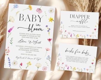 May include: A baby shower invitation with a floral design. The invitation says "Baby in Bloom" and includes the names "Olivia & Smith". The invitation also includes the date, time, and location of the shower. There are also two cards for guests to bring diapers or books for the baby.