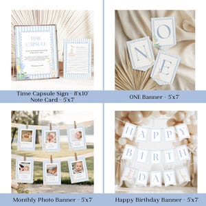 May include: A collection of baby shower decorations in a soft blue and white color scheme. Includes a time capsule sign, note card, "ONE" banner, monthly photo banner, and a "Happy Birthday" banner. Each item features a bunny illustration.