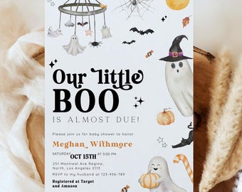 May include: A Halloween-themed baby shower invitation with the text "Our little BOO is almost due!" featuring illustrations of ghosts, bats, pumpkins, and a witch hat. The invitation includes event details and RSVP information.