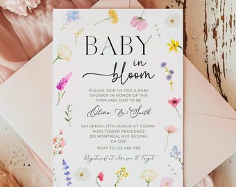 May include: A baby shower invitation with a floral design. The invitation says "Baby in Bloom" and includes the names "Olivia & Smith". The event is scheduled for Saturday, March 17th at 7:00 PM at the Ikon Tower Residence in Regina, Canada. RSVP information is included.