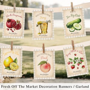 May include: A garland of decorative banners featuring watercolor illustrations of fruits and vegetables. The banners include pomegranates, honey, a cucumber, a lemon, a peach, and strawberries. Each banner has text, including "A Shower of Love & Pomegranates" and "She Found Her Honey."
