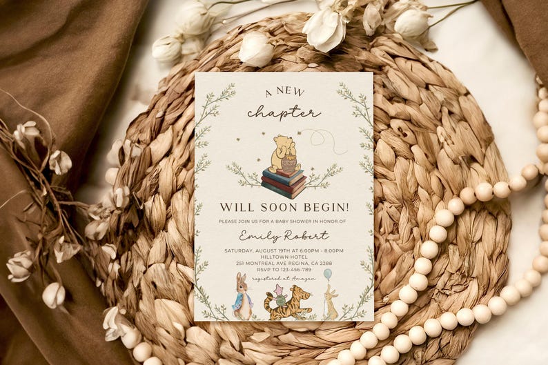 May include: A Winnie the Pooh themed baby shower invitation with a green leafy border. The invitation reads "A New Chapter Will Soon Begin!" and includes the text "Please join us for a baby shower in honor of Emily Robert". The invitation also includes the date, time, and location of the shower.