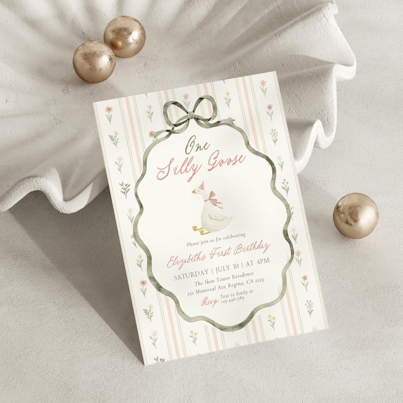 May include: A whimsical invitation for a first birthday celebration. The design features a cartoon goose wearing a party hat, framed by a decorative border and bow. The invitation includes the text "One Silly Goose" and event details.