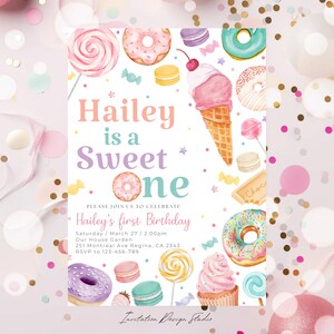 May include: A colorful invitation for a first birthday party with a sweet theme. The invitation features a donut, ice cream cone, lollipops, and other sweets. The text on the invitation reads "Hailey is a Sweet One".