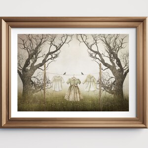 May include: A framed illustration of three white dresses hanging on a clothesline between two bare trees. The dresses are in a field with green grass and wildflowers. Two small birds are perched on the clothesline.