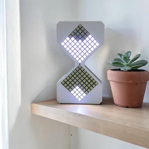 Cyber style LED electronic hourglass timer with digital sand display and modern desk decoration aesthetic
