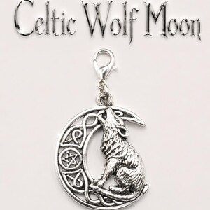 May include: Silver-toned charm featuring a howling wolf silhouette set against a crescent moon with Celtic knotwork. The charm includes a lobster clasp for easy attachment. The words "Celtic Wolf Moon" are above the charm.