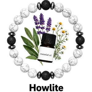 May include: A circular beaded bracelet made of white howlite stones with grey veining, interspersed with black porous lava beads and small metallic spacers. In the centre, a small brown glass bottle labelled essential oil sits with lavender and chamomile.