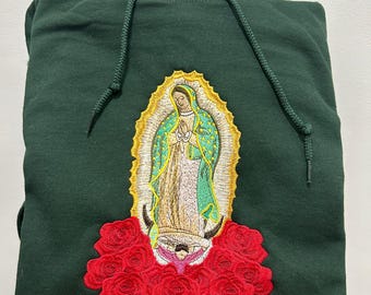 Broderad tröja med motiv från Vår Fru av Guadalupe