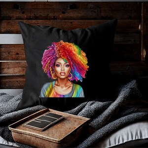 May include: A black throw pillow with a colorful illustration of a woman with rainbow hair. The woman is wearing a rainbow shirt and has a colorful background.