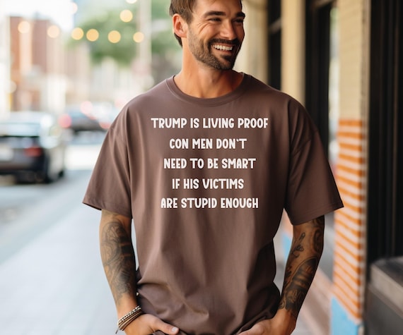Anti Trump Con Man T-Shirt: Humorous Political Protest Tee