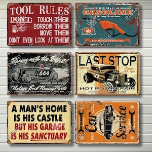 May include: Six vintage metal signs with a garage theme. The signs feature a hot rod, a gas station, a tool rule, a car service, a racing car, and a garage quote. The signs are all in a distressed style with rusty edges.