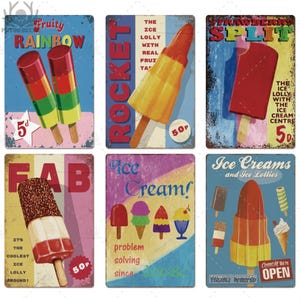 May include: A collection of six vintage-style metal signs featuring ice cream and ice lollies. The signs showcase colorful illustrations of various frozen treats, including rocket-shaped popsicles, ice cream cones, and fruit-flavored bars. Text includes "Fruity Rainbow", "Rocket", "Strawberry Split", "Fab", "Ice Cream!", and "Ice Creams and Ice Lollies".