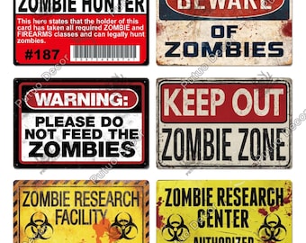 Könnte beinhalten: Sechs Vintage-Metallschilder mit Zombie-Motiv. Die Schilder sind rot, weiß und gelb mit schwarzem Text. Die Schilder zeigen: "United States Certified Zombie Hunter", "Vorsicht vor Zombies", "Warnung: Bitte füttern Sie die Zombies nicht", "Betreten verboten Zombie-Zone", "Zombie-Forschungseinrichtung", und "Zombie-Forschungszentrum".