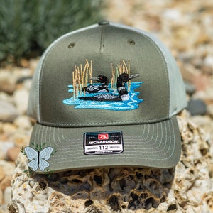 Two Loon Ducks In Reeds Embroidered Richardson 112 | 6 Panel Trucker Cap/Hat