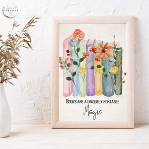 May include: A watercolor print with a stack of colorful books with flowers growing out of them. The text "Books are a uniquely portable magic" is below the books.
