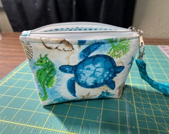 Zippered Beach Print Pouch, fully lined with coordinated fabric.