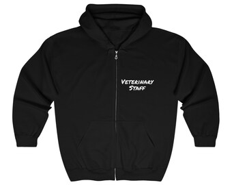 May include: Black zippered hoodie with the text "Veterinary Staff" in white on the front.
