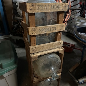 Great Bear Spring Co. 5 gal. Glass bottle with crate