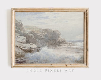 May include: A watercolour painting of a rocky coastline with crashing waves. The painting is framed in a light wood frame.