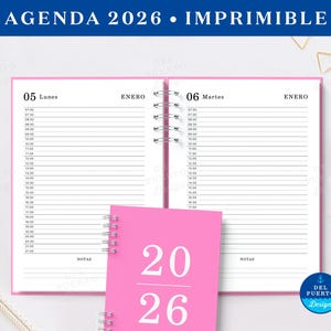 May include: A pink 2026 agenda with a spiral binding, open to show lined daily planner pages. The cover displays the year 2026 in large numbers. The text "AGENDA 2026 • IMPRIMIBLE" is at the top.