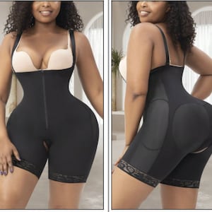 May include: Black body shaper with a zipper in the front and lace trim at the bottom. The shaper has a built-in bra and a high-waisted design.