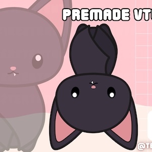 May include: A black and pink cartoon bat with large eyes and a pink nose. The bat is hanging upside down with its wings spread out. The background is a pink and white grid pattern.