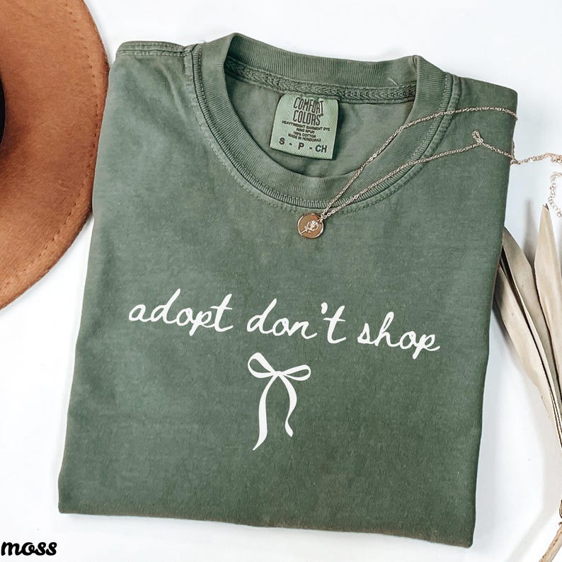 Adopt don't shop tee, animal rescue shirt, cute graphic tee, casual slogan tee, animal lover gift, vegan apparel, pet adoption shirt