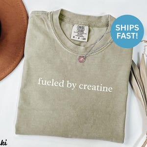 Fueled by creatine shirt, workout graphic tee, gym motivation shirt, fitness slogan t-shirt, funny workout top, ships fast