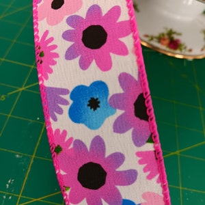 Pink, blue, purple flower 1.5 wired ribbon for wreaths and floral arrangements.