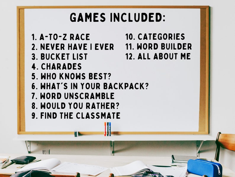 May include: A white board with a black frame lists 12 games for a classroom game night. The games include "A-to-Z Race", "Never Have I Ever", "Bucket List", "Charades", "Who Knows Best?", "What's in Your Backpack?", "Word Unscramble", "Would You Rather?", "Find the Classmate", "Categories", "Word Builder", and "All About Me".