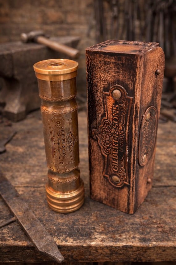 A solid brass, hand-engraved kaleidoscope that looks like it belongs in a Victorian explorer's kit — real optical craft, not a toy aisle gimmick.
