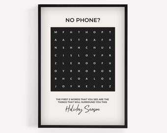 Op de afbeelding: Een zwart-witte printbare poster met een woordzoeker. De puzzel heeft de titel "No Phone?" en de tekst onder de puzzel luidt "De eerste 3 woorden die je ziet zijn de dingen die je deze feestdagen zullen omringen."